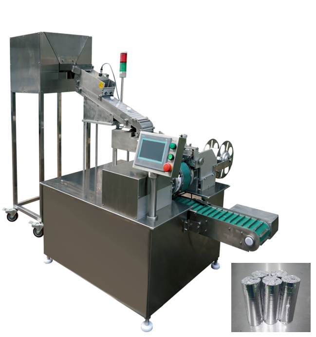 Machine for group packaging of tablets in foil paper