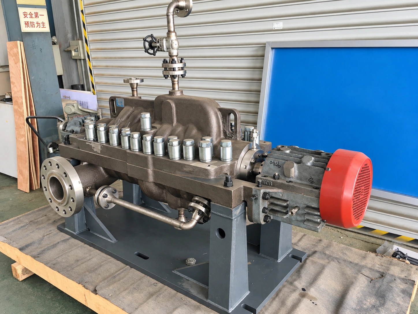 Horizontal split-casing pump with a red shaft-end cover.