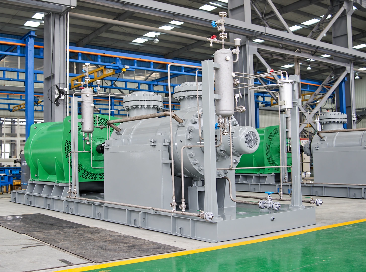 Barrel pump package with green motors and auxiliary pipework.